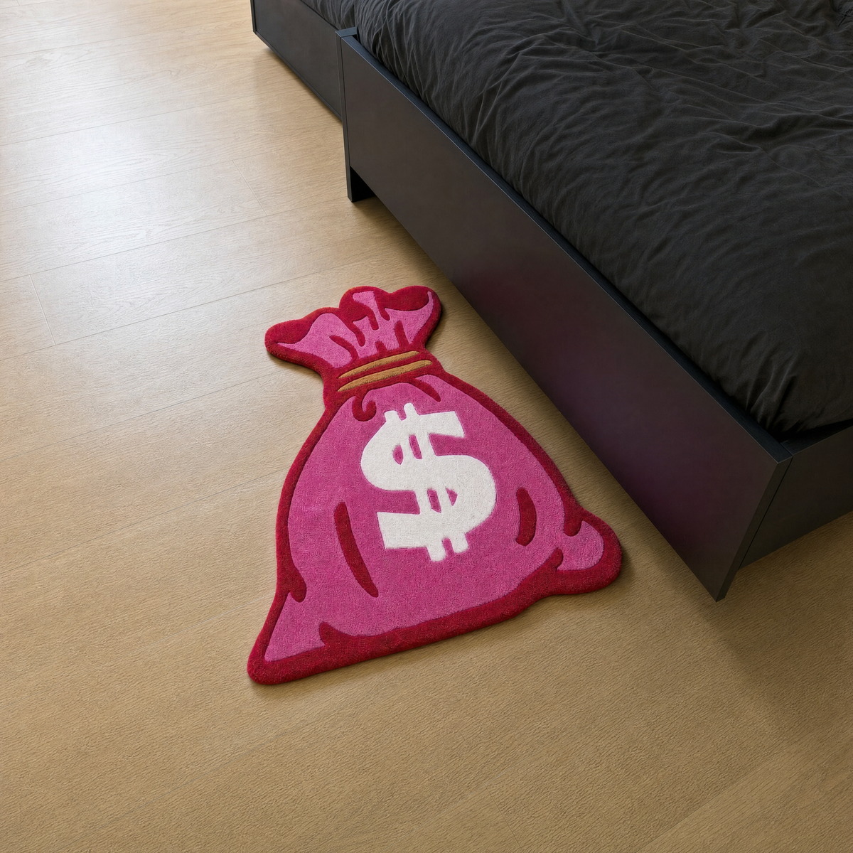 Custom hand-tufted rug on a light wood floor beside a matte black bed in a minimal black bedroom